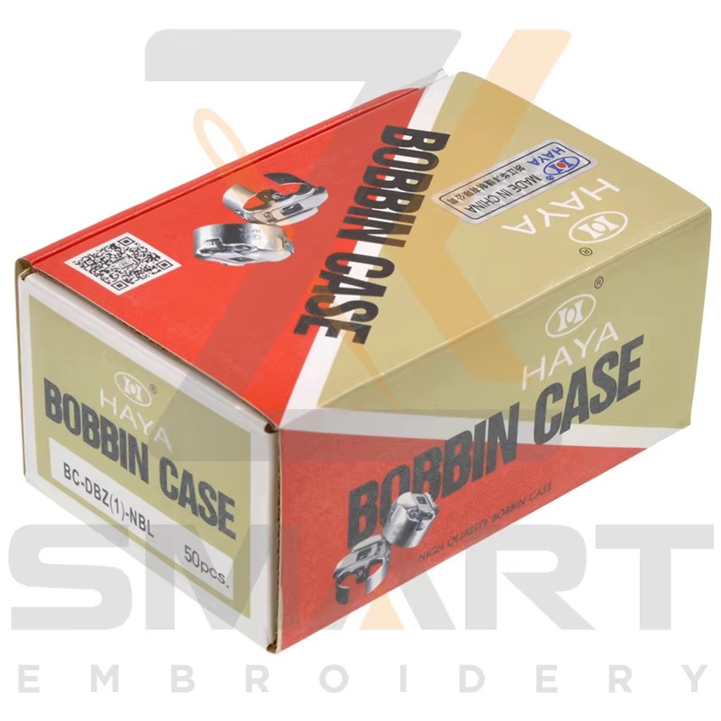 HAYA Bobbin Case BC-DBZ(1)-NBL6 dengan Spring untuk Tajima SWF Barudan Cina Mesin Embroidery R02HY01